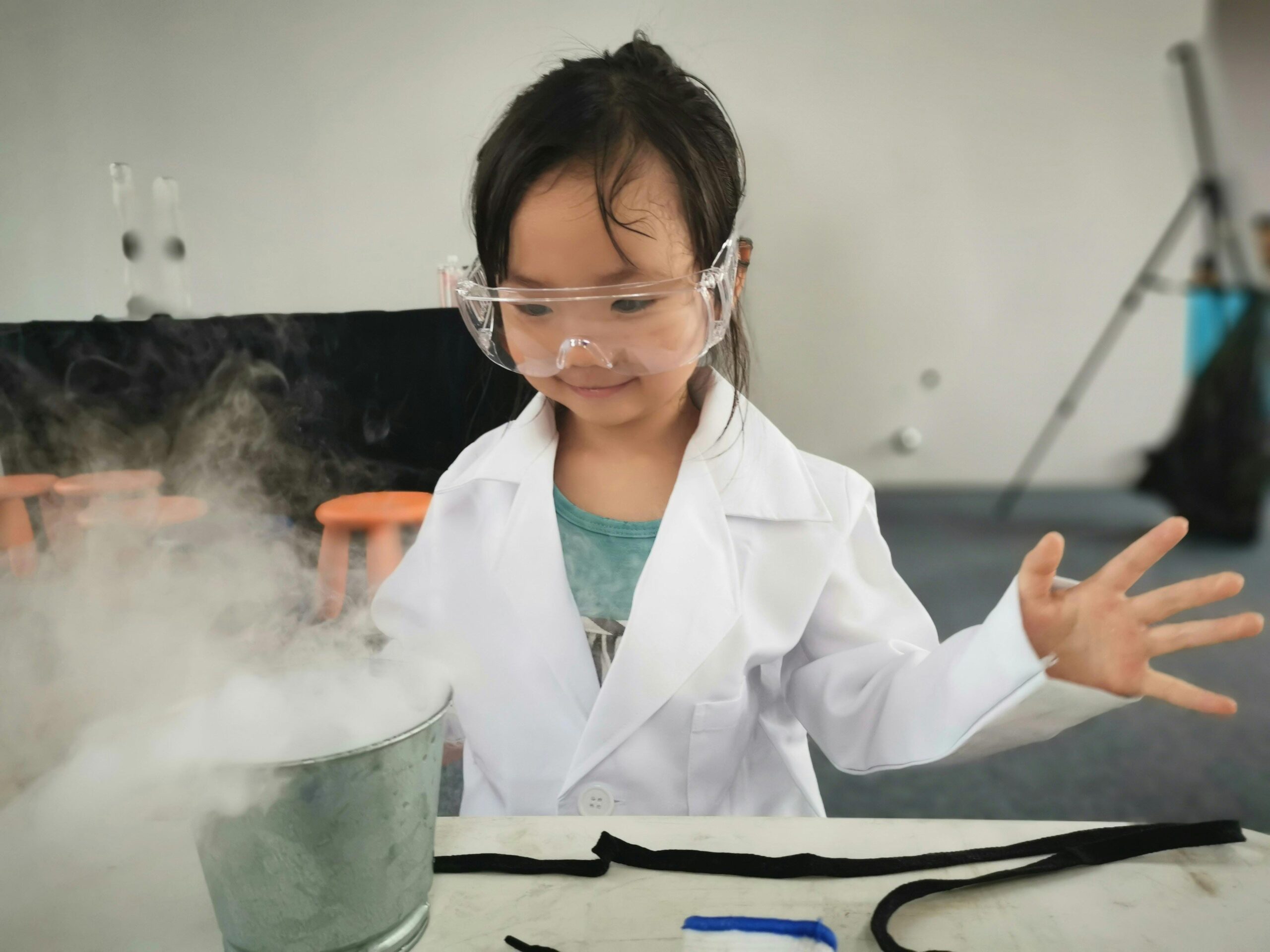 A child exploring chemistry via an experiment